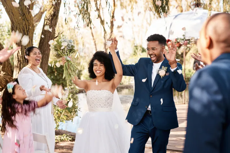 Husband and Wife celebrating on their wedding day.