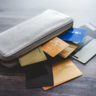 wallet with credit cards spilling out